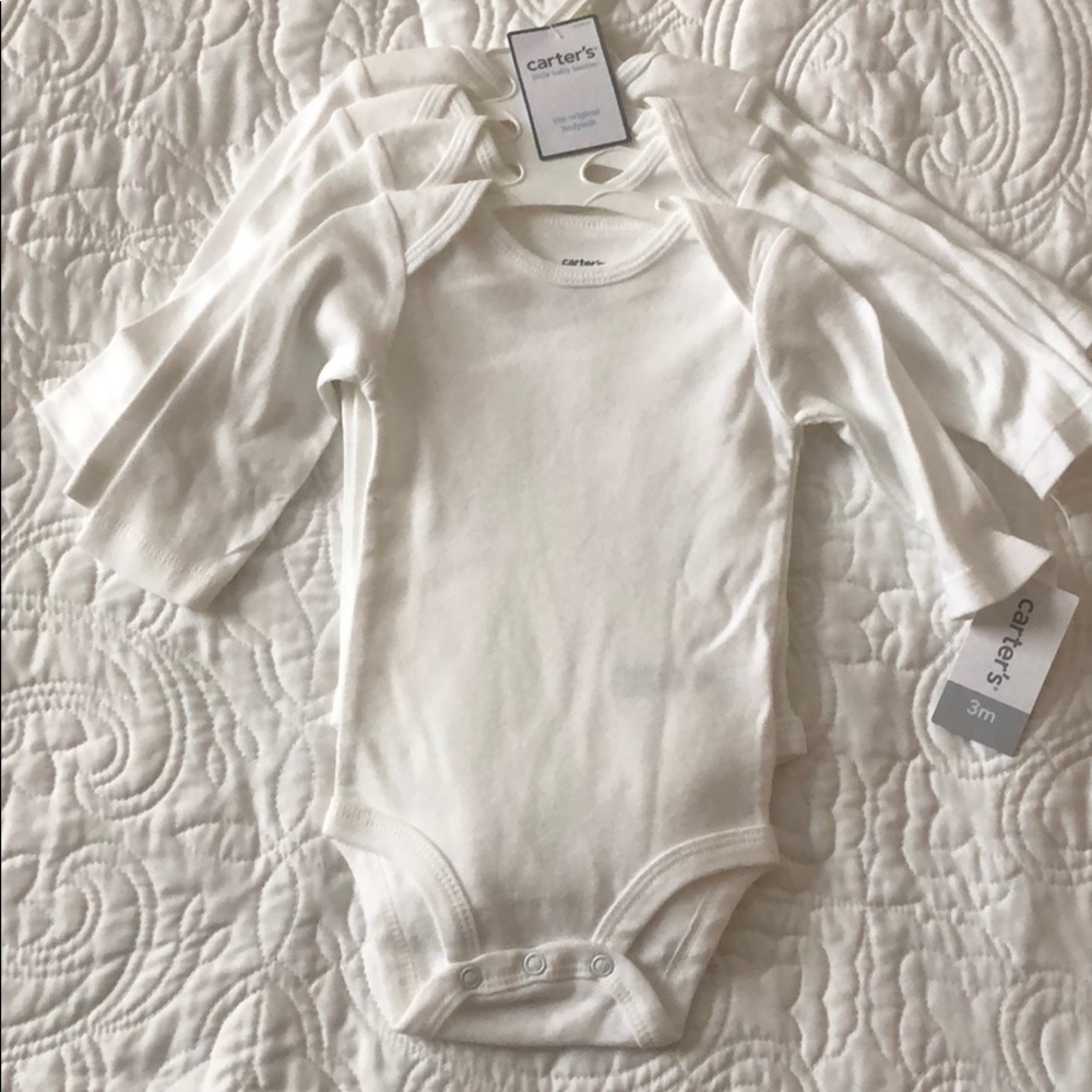 4 pack of carter’s bodysuits